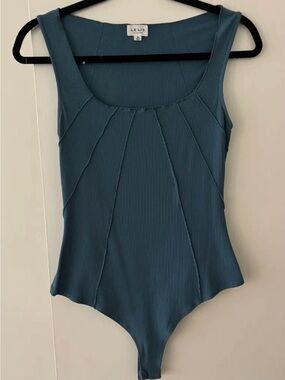 These Three Scoop Neck Ribbed Bodysuit